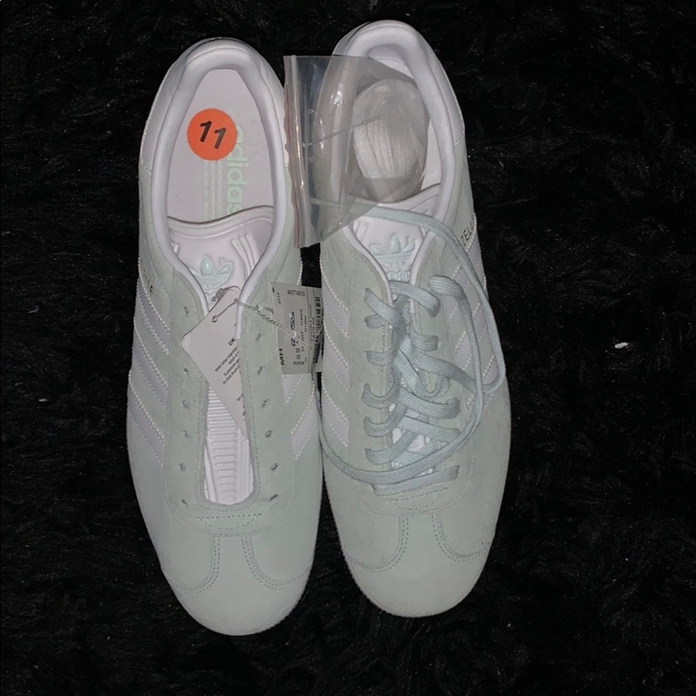 Adidas shoes(NEVER WORN NEW)